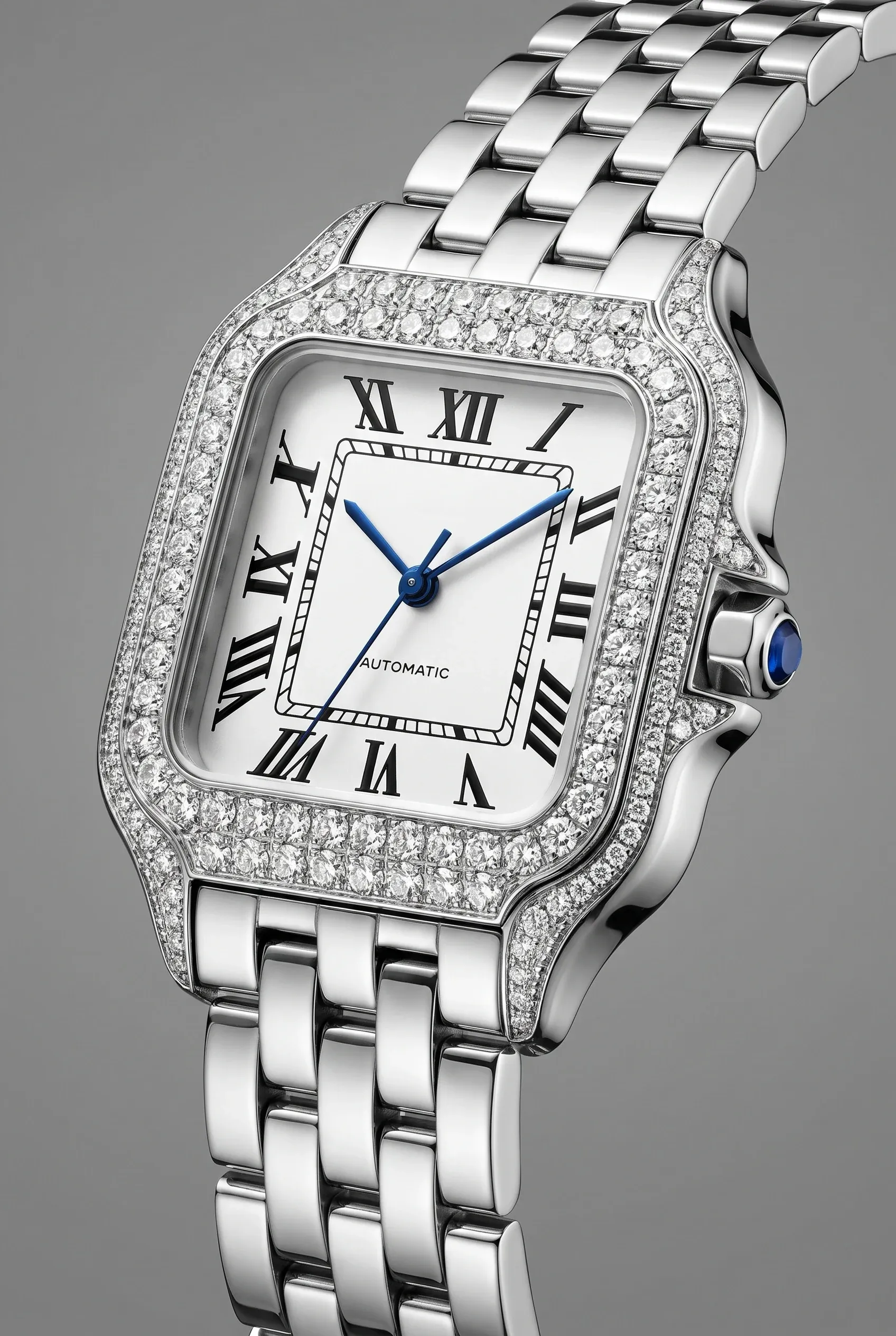 Slim stone-bezel dress watch paired with larger clean bracelet watch in a balanced his and hers styling.
