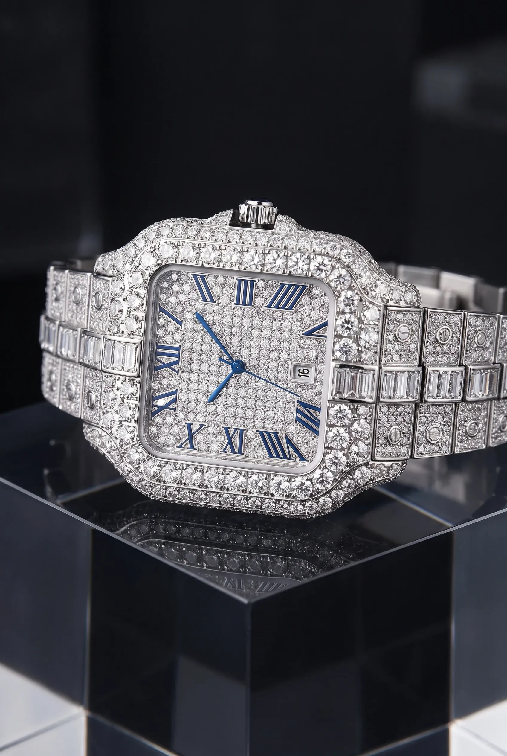 Silver tone fully iced men’s watch with dense clear stones on a dark acrylic display block.
