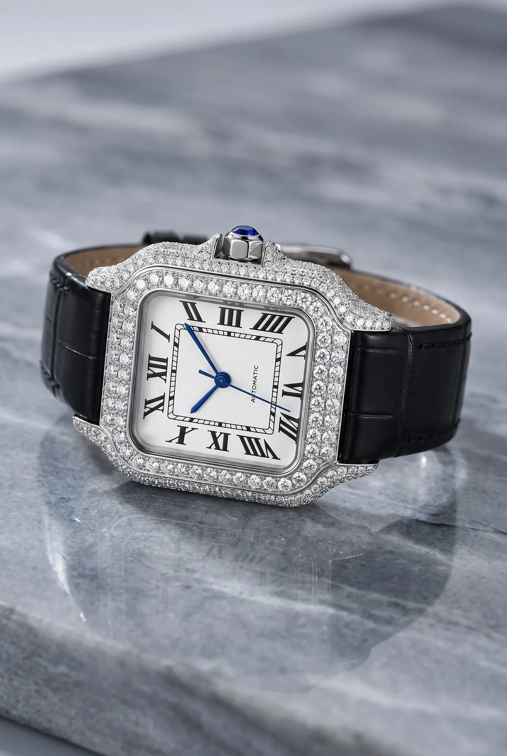 Close-up of a women's square watch with a leather strap and a moissanite set bezel.
