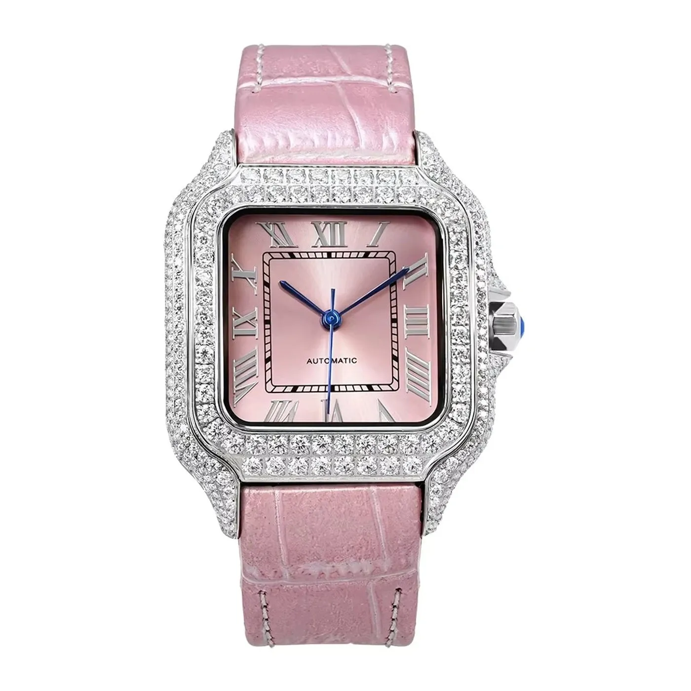 Rose-gold toned watch with set bezel resting on a plain surface
